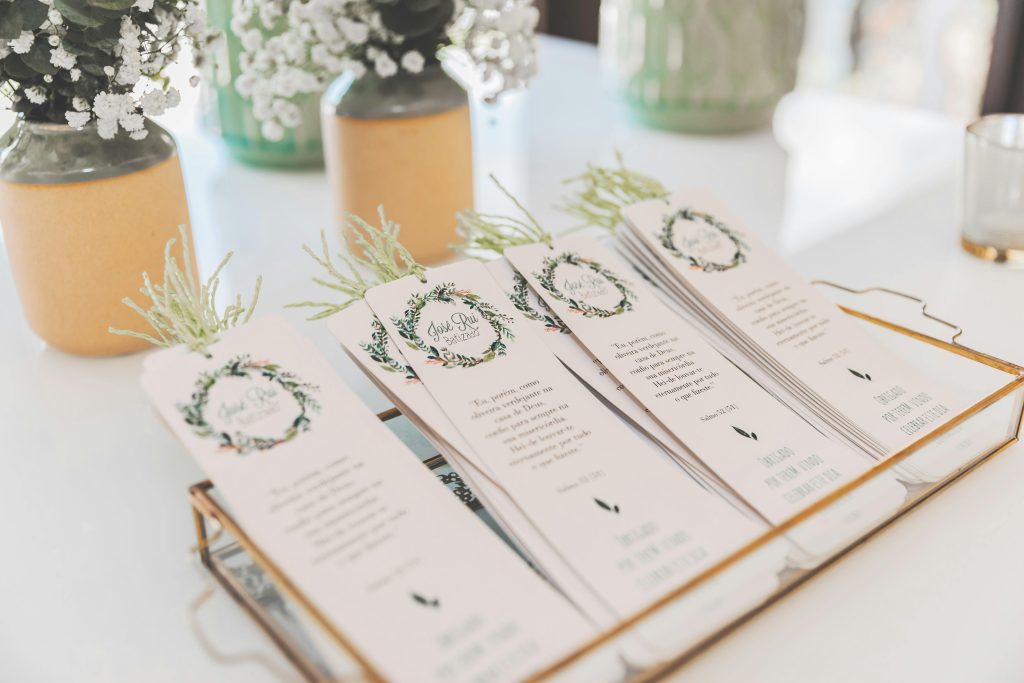 Beautifully arranged wedding ceremony programs with floral decor in Portugal.